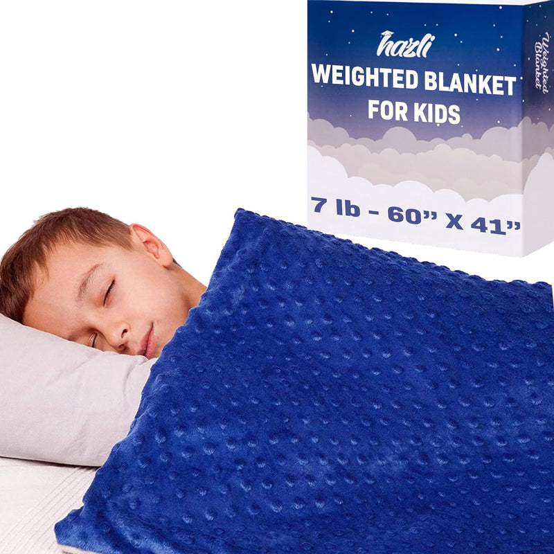 Boy sleeping under the Hazli 7 lb kids weighted blanket, 41 x 60 inches, blue minky cover, with gift box