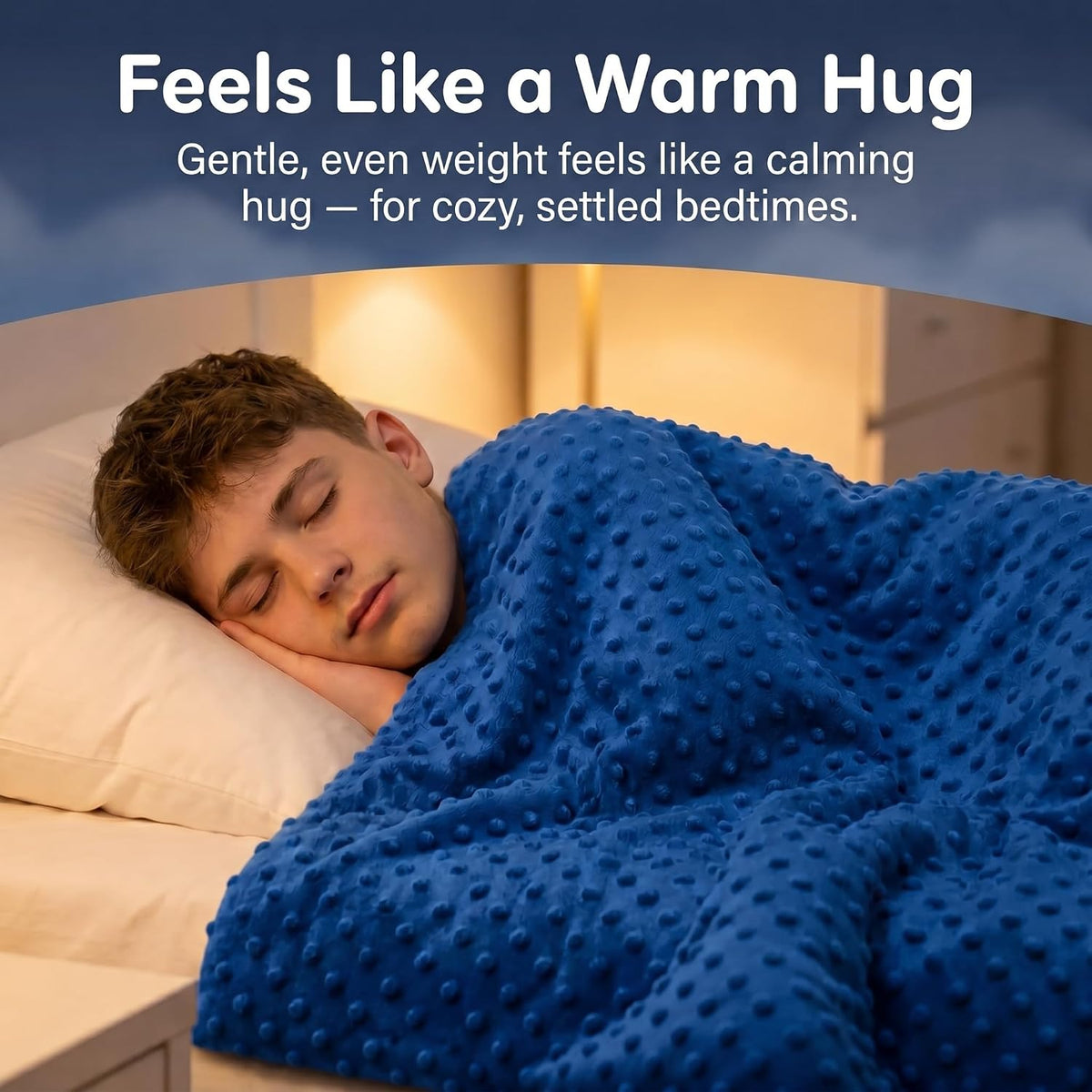 Boy asleep with a puppy under the navy Hazli kids weighted blanket